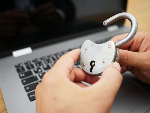 padlock and laptop representing cyber security